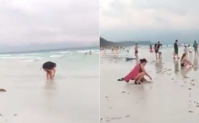 Video: Turista filmada a enterrar fralda em praia paradisíaca